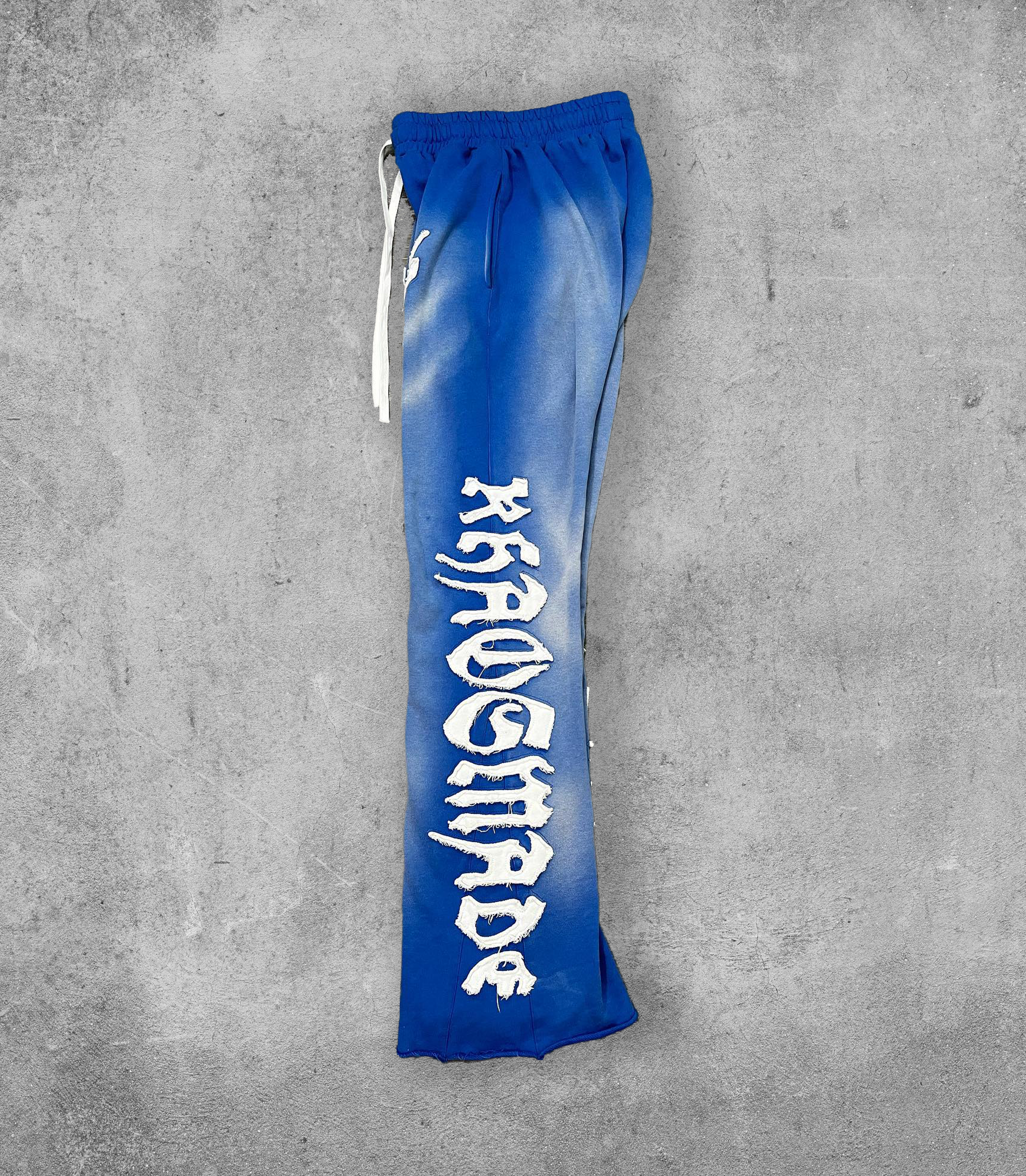 KHAÖS FLARED SWEATPANTS BLUE