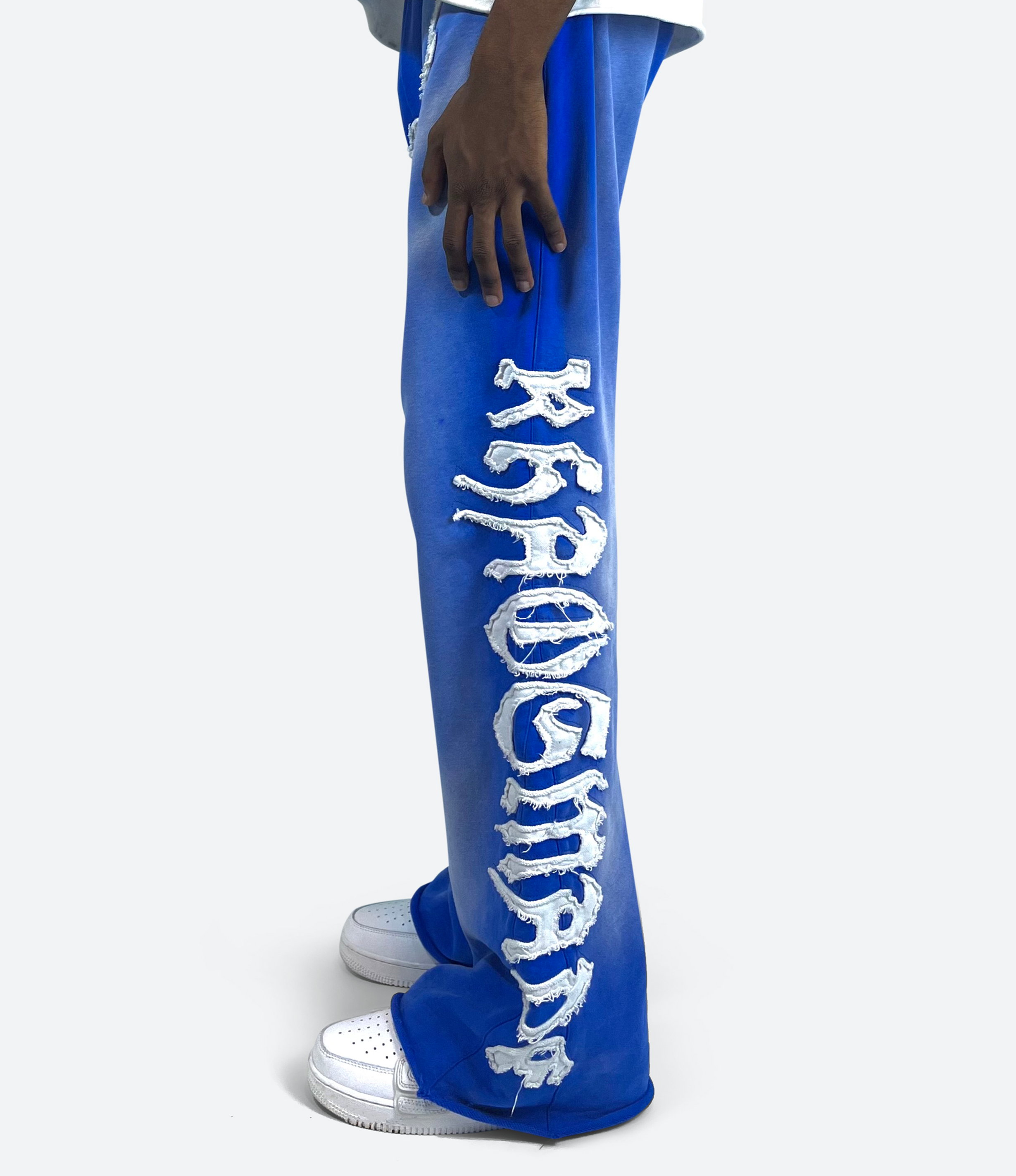 KHAÖS FLARED SWEATPANTS BLUE