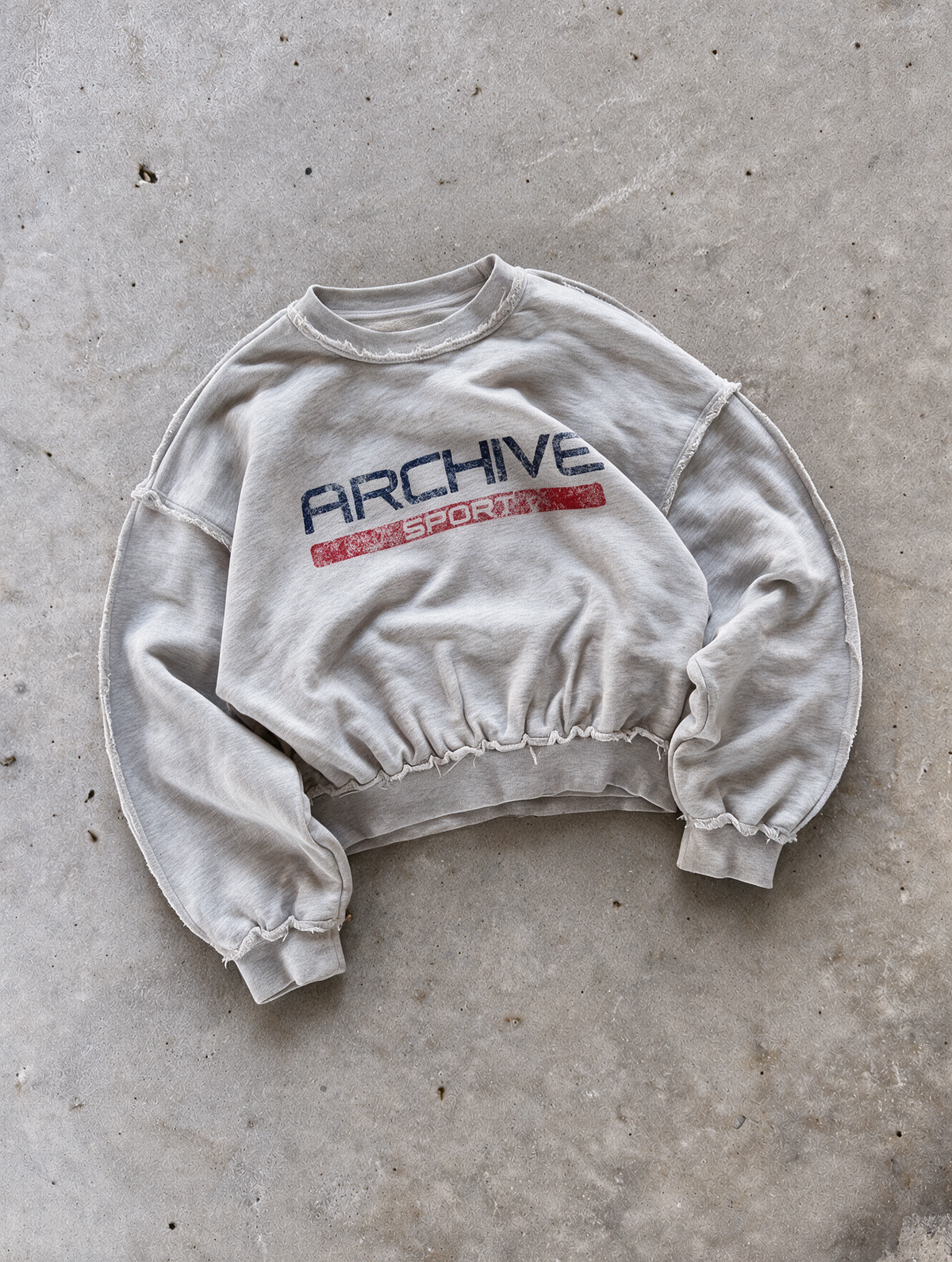 'ARCHIVE SPORT' distressed crewneck sweatshirt in gray, front flat-lay view 5