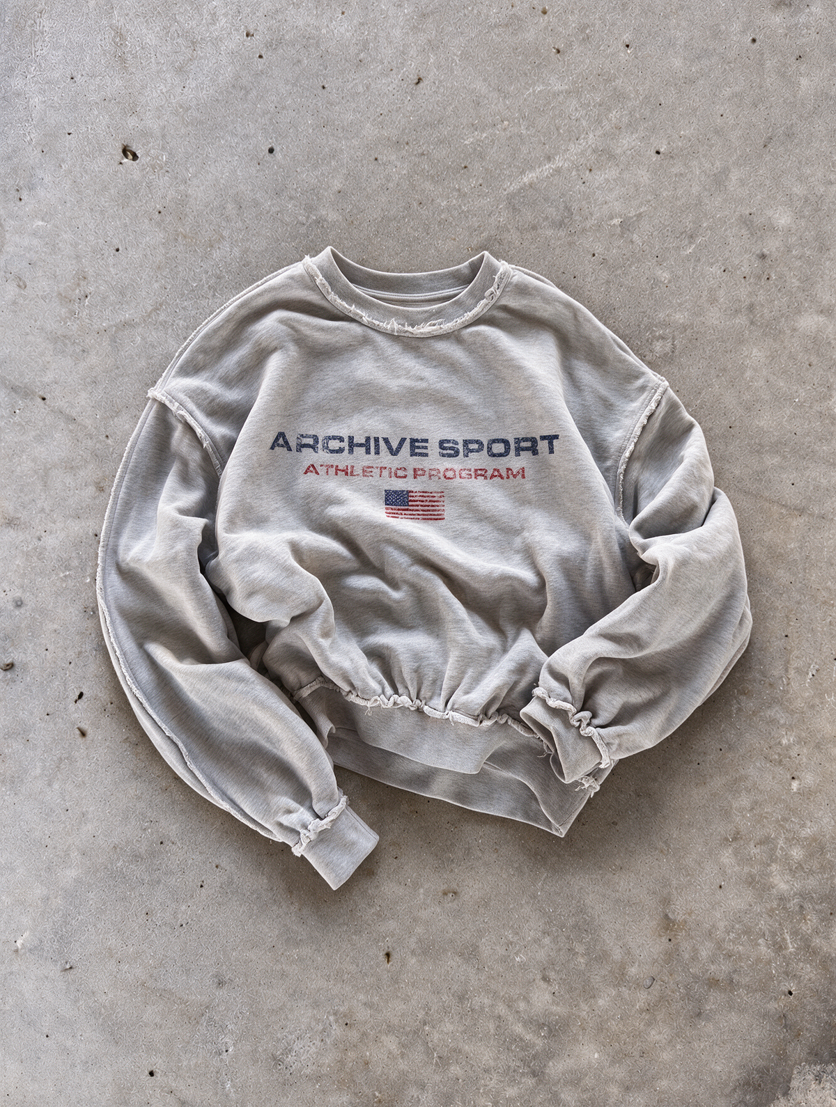 'ARCHIVE SPORT USA' distressed crewneck sweatshirt in gray, front flat-lay view 4