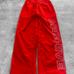 ARCHIVE 'STATEMENT' NYLON PANTS - RED